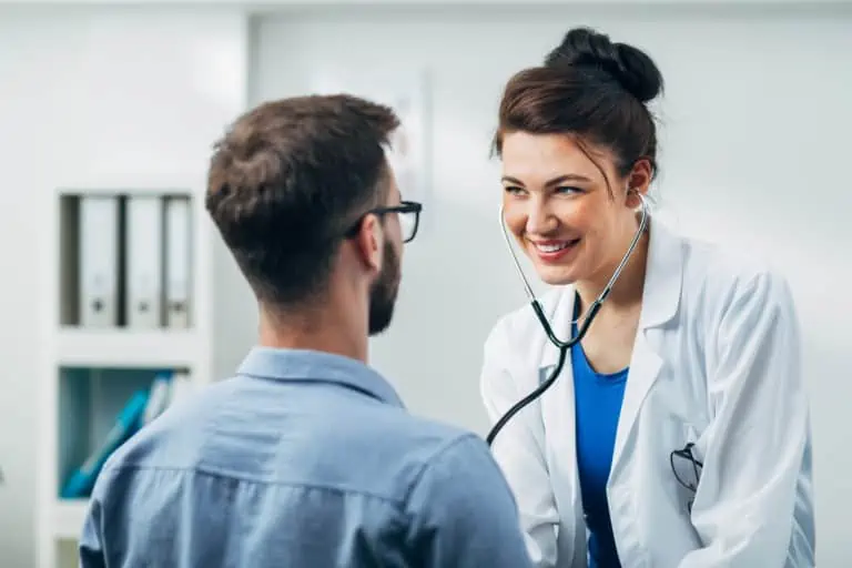 Doctor,And,Patient,Sitting,In,Doctor's,Office